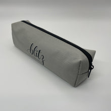Load image into Gallery viewer, Gray pencil case with black zipper on a white background